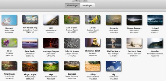 Linux Mint bevat een aantal aardige foto's die u als bureaubladachtergrond kunt gebruiken. U ziet ze hier op deze schermafbeelding. U kunt ook een eigen foto inzetten.